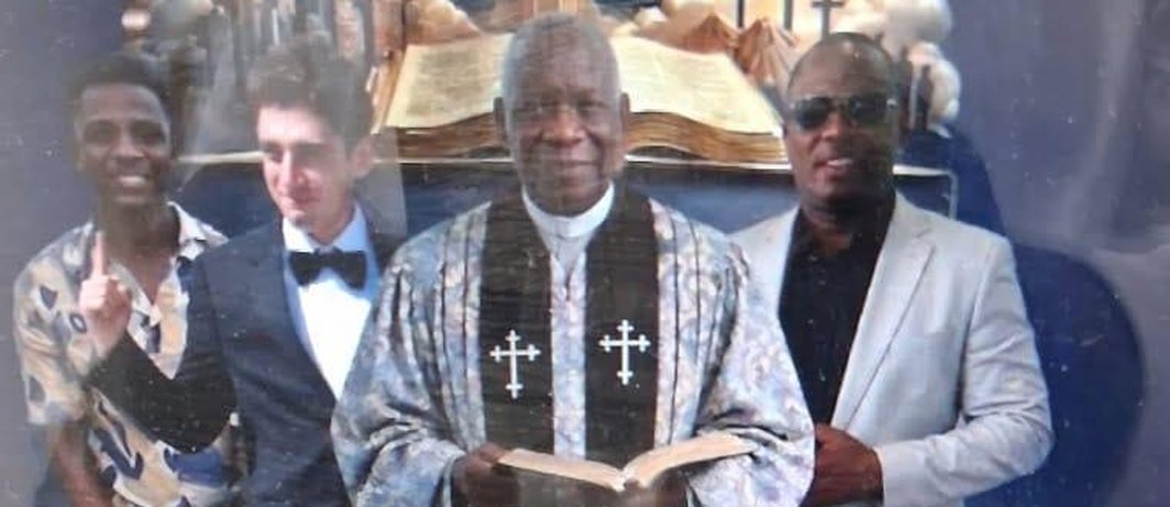 Bishop Maxwell Roberts in the center of the Missions Africa team
